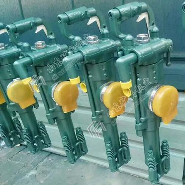 YT27型气腿式凿岩机除具备YT23型钻机的优点外还采用凸缘控制阀